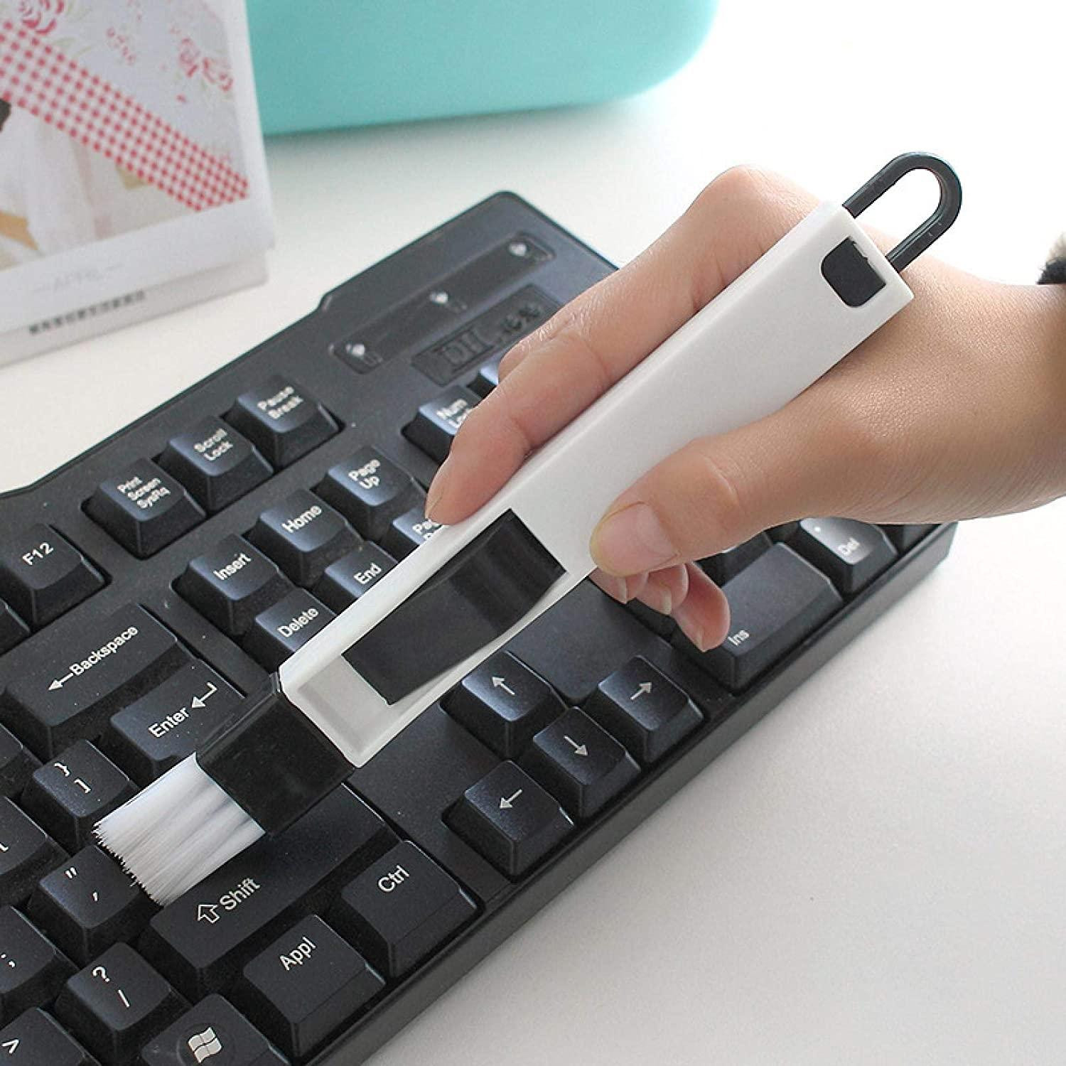 Cleaning brush for keyboard and window frame