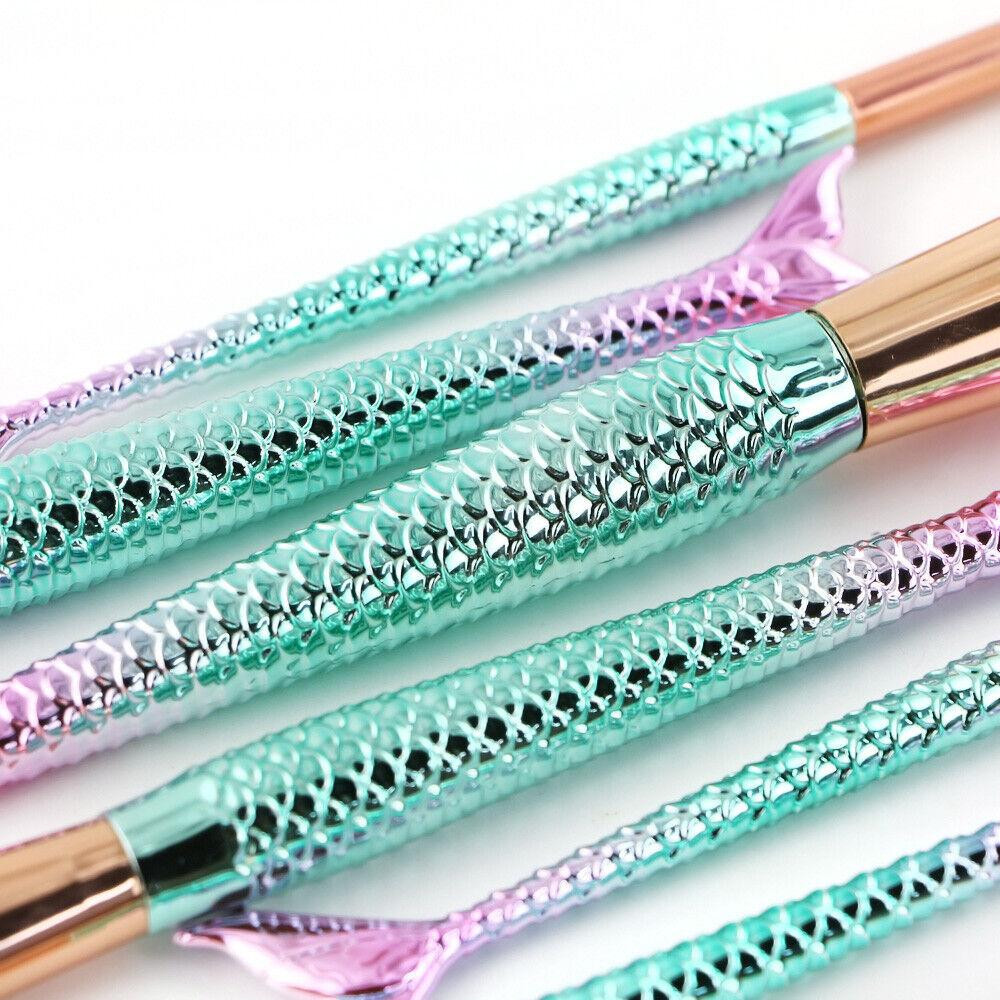 Multicolored mermaid makeup brushes