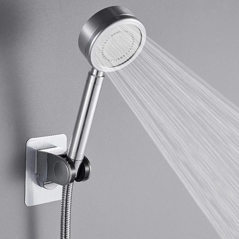Self -adhesive wall bracket for shower nozzle