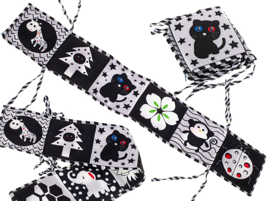 Folding crib bumper with ladybug design