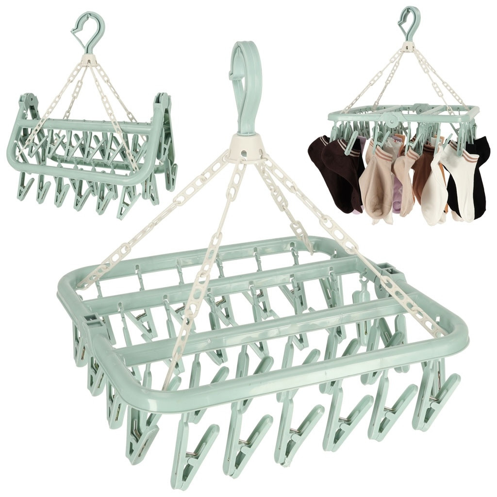 Compact drying rack with 32 clothes pegs