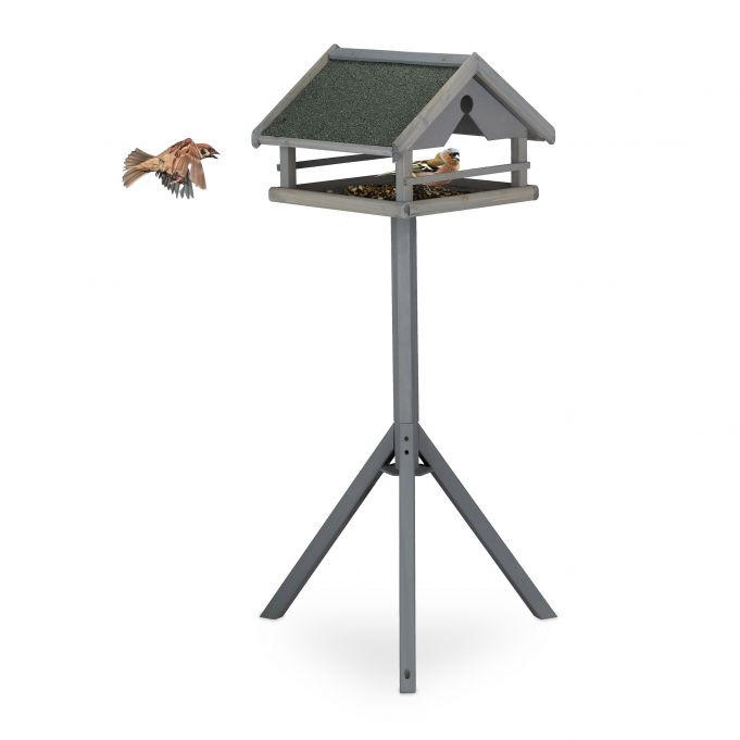 Mesa para pássaros cinza no poste