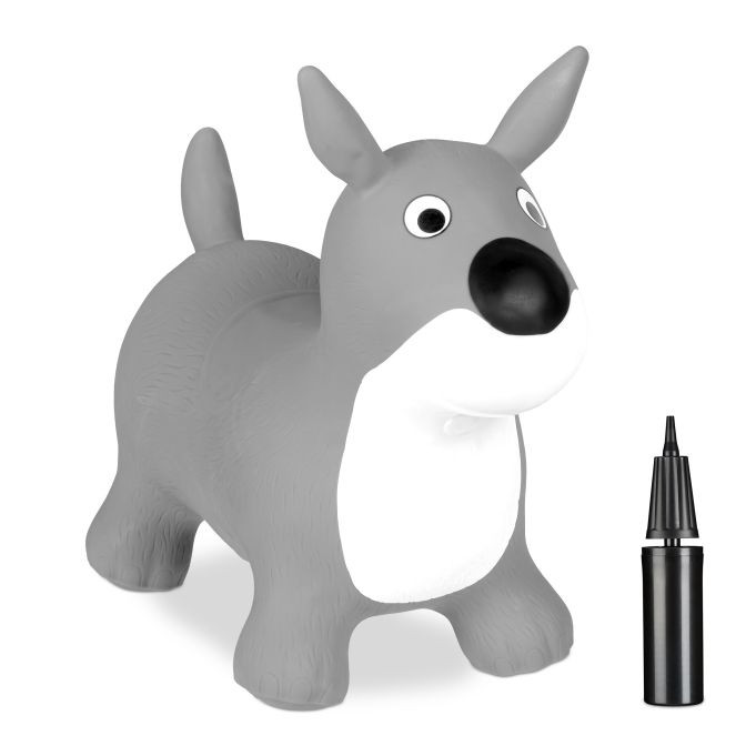 Perro saltando en gris