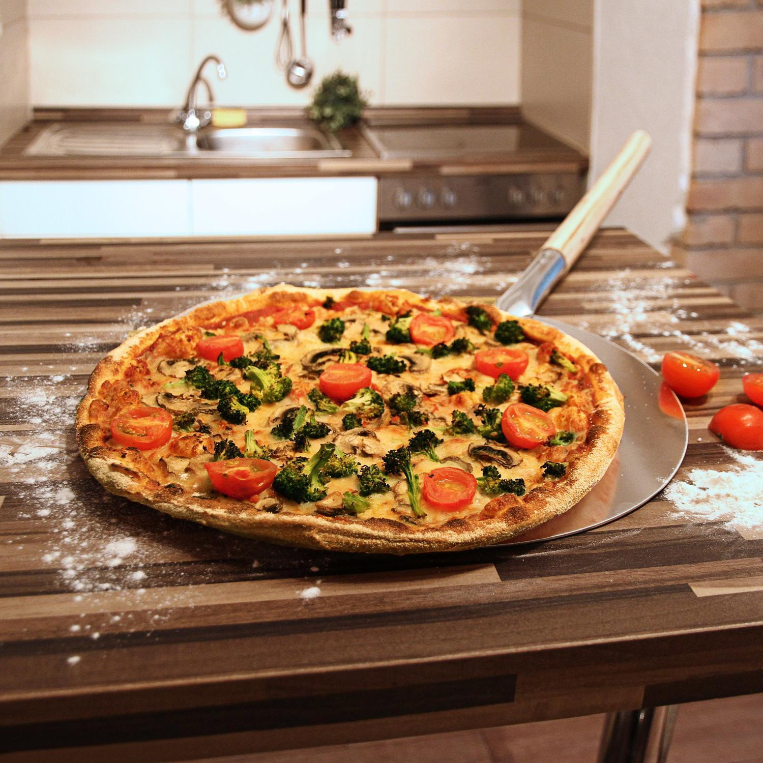 Pá de pizza redonda