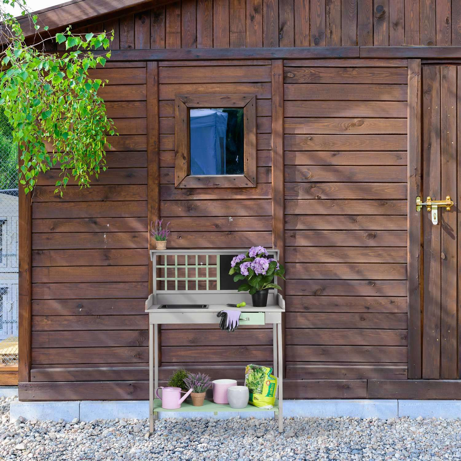 Mesa jardinera con bañera