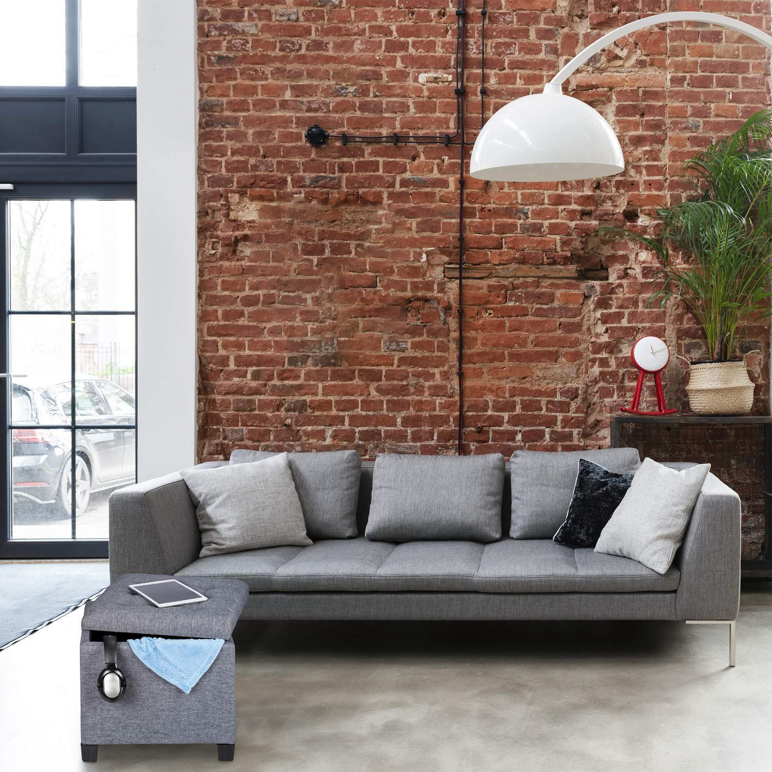 Hocker mit Polsterung in Grau
