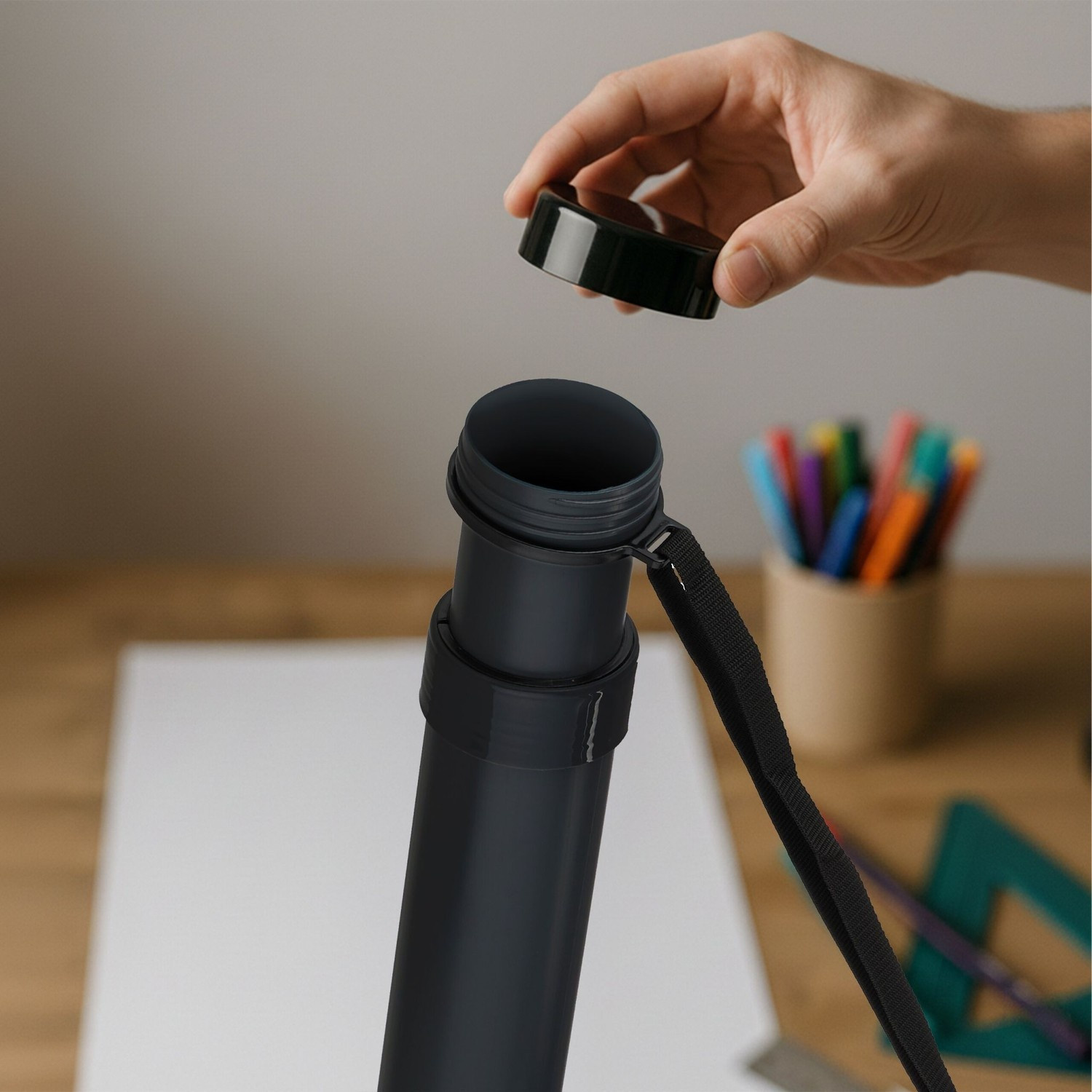 Tube à affiche extensible avec sangle réglable