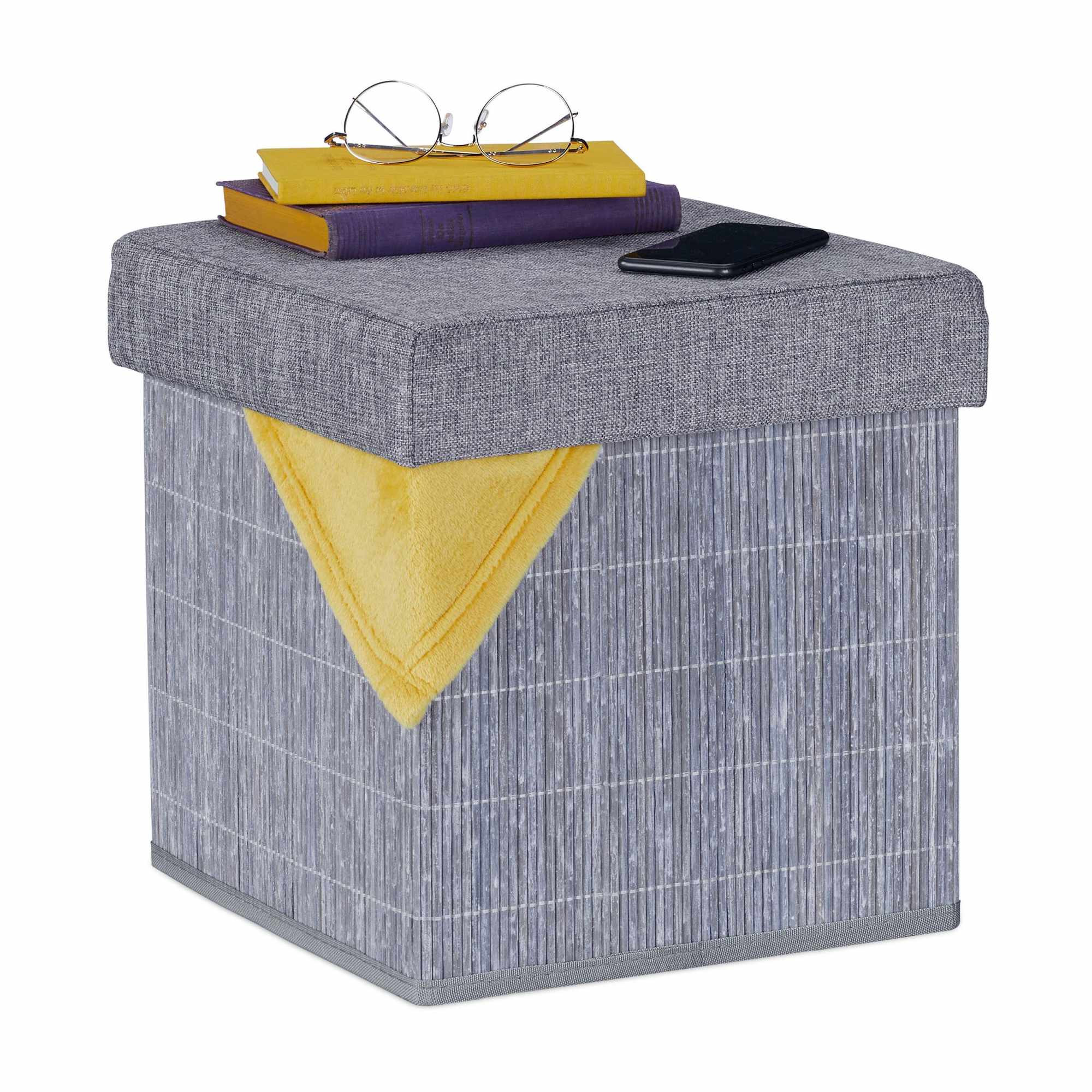 Taburete gris con espacio de almacenamiento