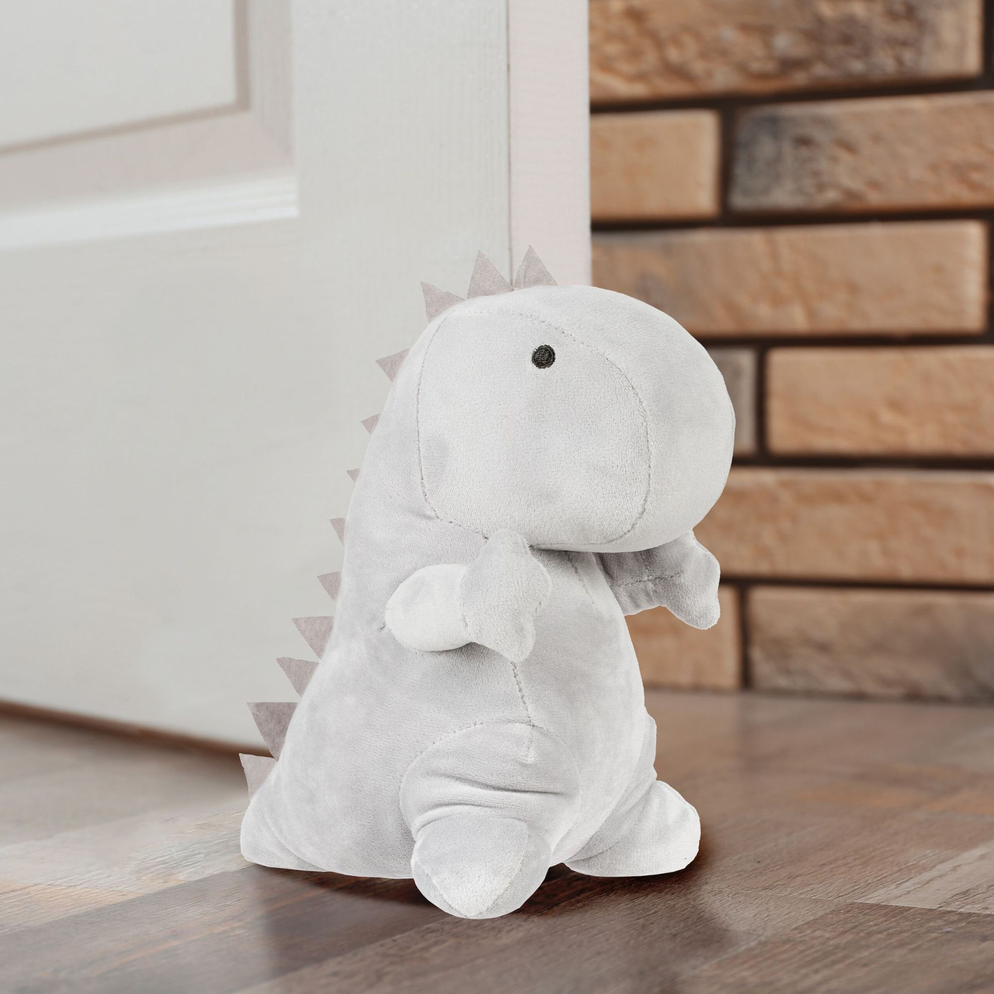 Grijze deurstopper Dino
