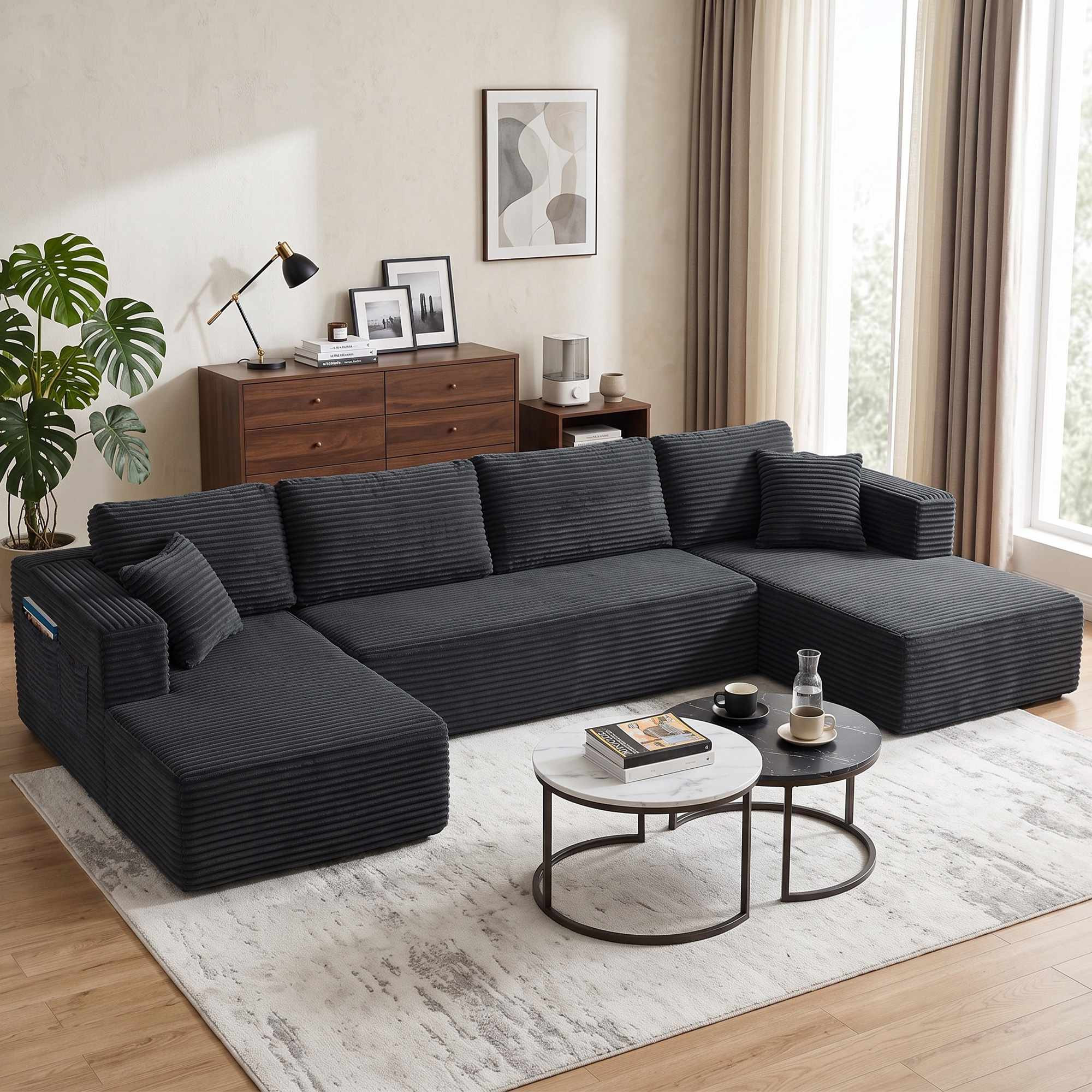 Sofá-cama modular em formato de U com chaises, cor cinza escuro.