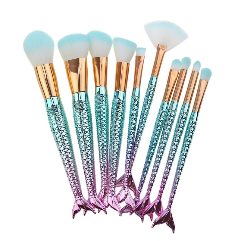 Multicolored mermaid makeup brushes