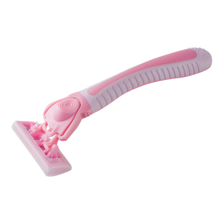 Razor with replaceable blades in a storage box - Pink