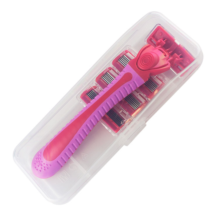 Razor with replaceable blades in a storage box - Red