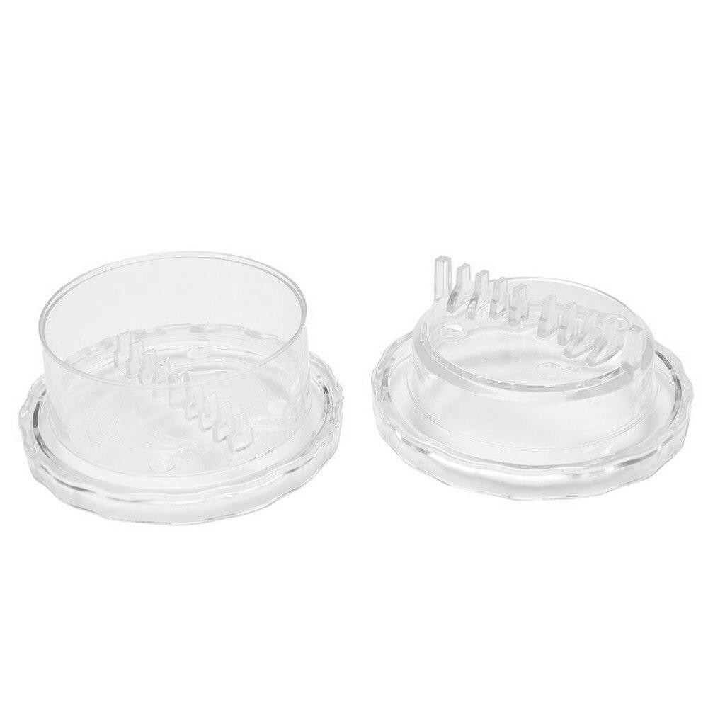 Knoflookpers in plastic